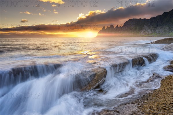 Waves on the rocky beach of Tungeneset