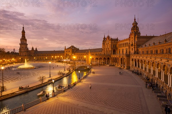 View over the illuminated Plaza de Espana at dusk Panorama