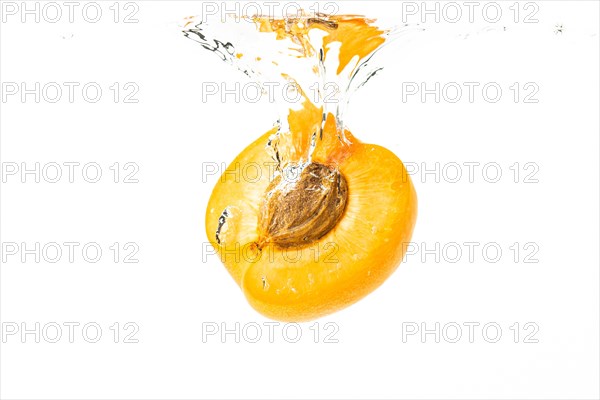 Apricot falls into the water