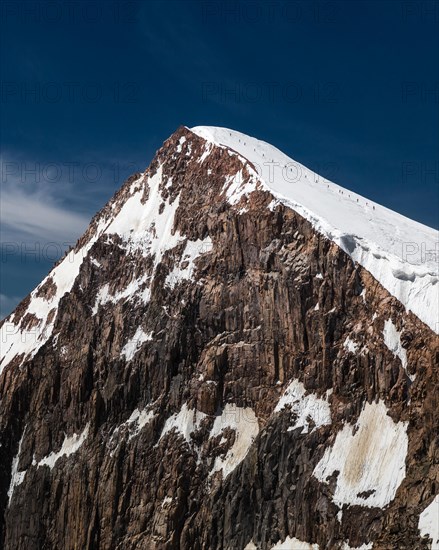 Moment of a success. Summit of Kharkhiraa mountains. 4037m. Uvs province