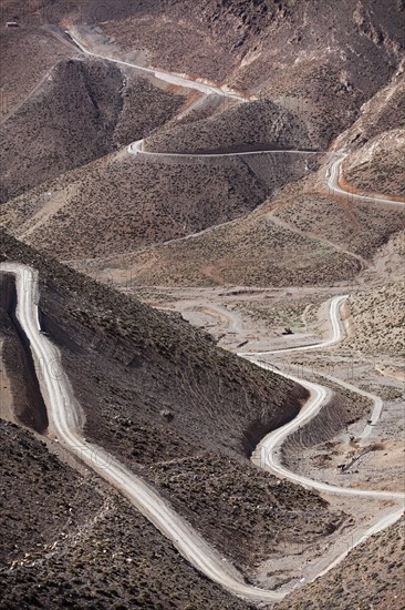 Off-road vehicle on gravel road to Mount Mgoun