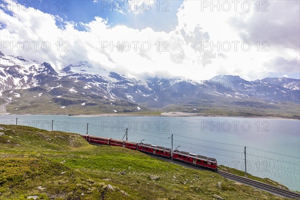 Rhaetian Railway in front of the Lago Bianco reservoir