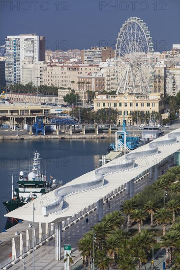 Ships and Palmeral De Las Sorpresas in the port of Malaga