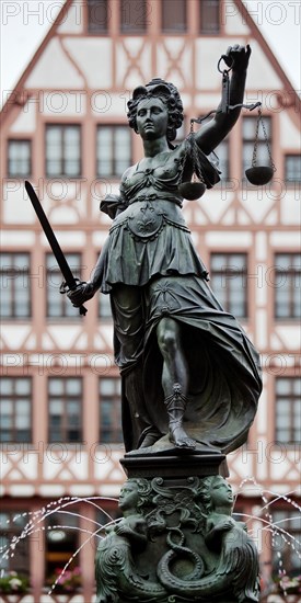 Justitia with scales and sword