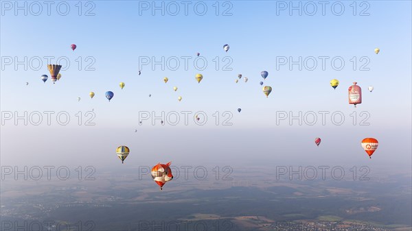 Countless hot air balloons in different colours and shapes