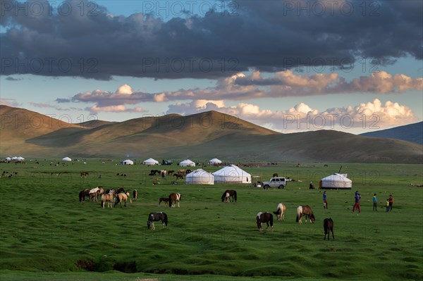 Summer evening in summer camp. Tsambagarav mountain