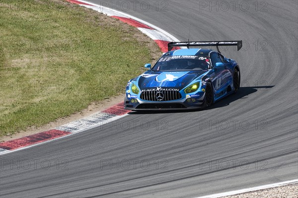 Mercedes-AMG GT3 drives on race track