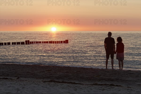 Couple holding hands