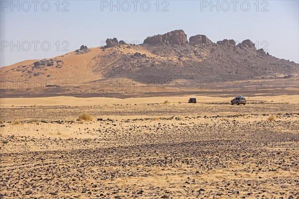 Off-road vehicle on gravel road to the high Atlas Mountains