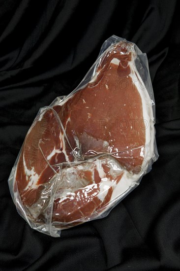 A vacuum-sealed Jamon serrano without bones