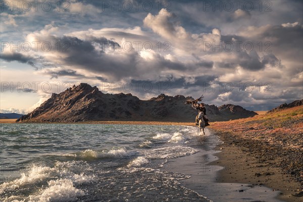 Eagle hunter by the lake. Tolbo lake