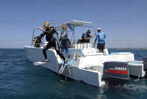 Diver jumps off the boat