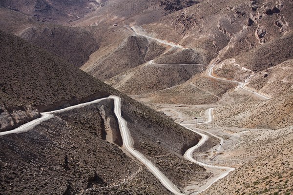 Off-road vehicle on gravel road to Mount Mgoun