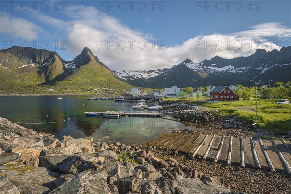 Boat ramp and fishing boats on the fjord in Mefjord
