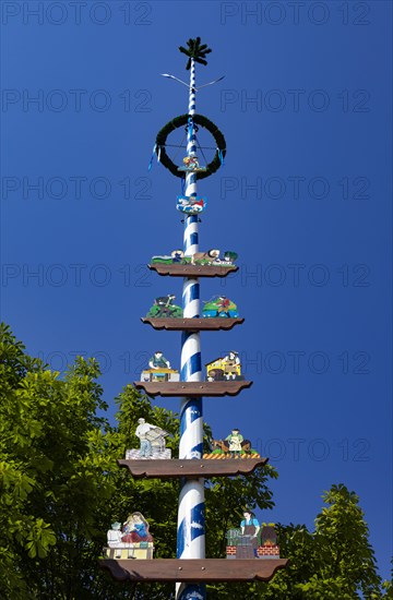 Maypole with woodcarving