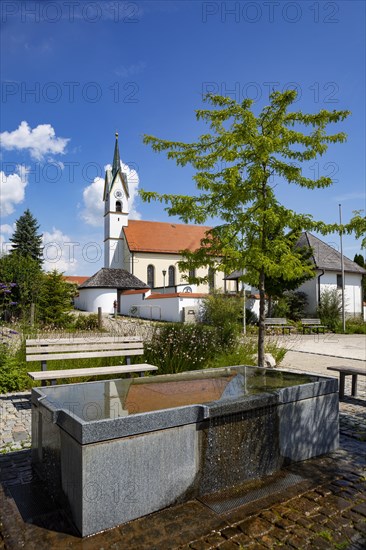 Fountain in front of the church Sankt Florian