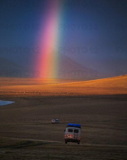 To the rainbow. UAZ van is the most popular vehicle for Mongolian tourism. Uvs province