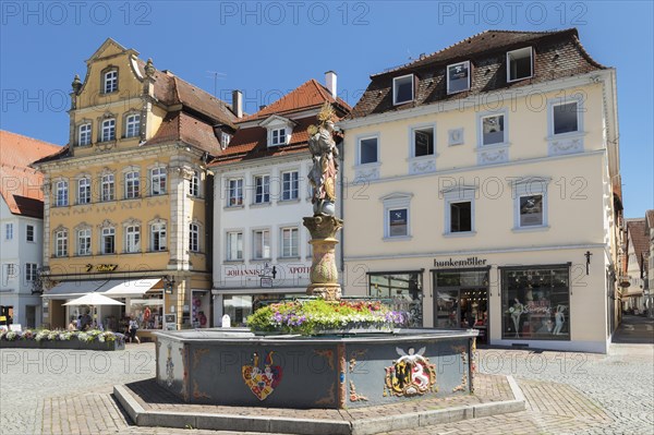 Madonna with a crescent moon on the Marienbrunnen fountain on Marktplatz square