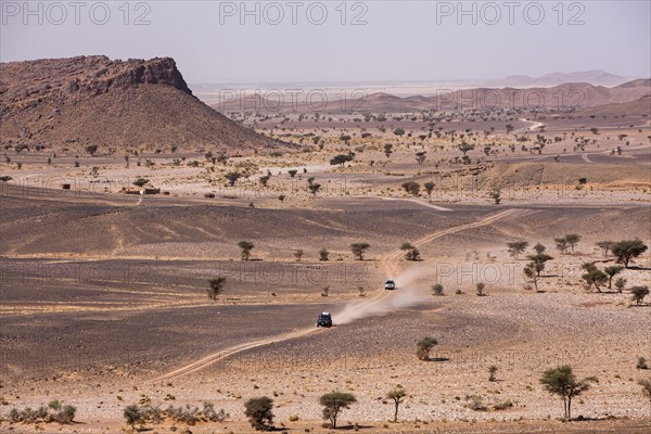 Off-road vehicle on gravel road to the high Atlas Mountains