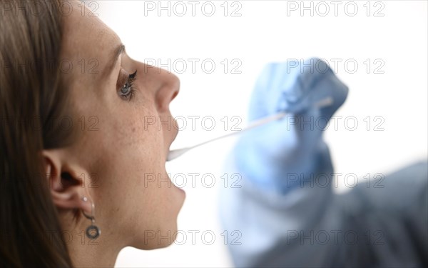 Woman receives throat swab