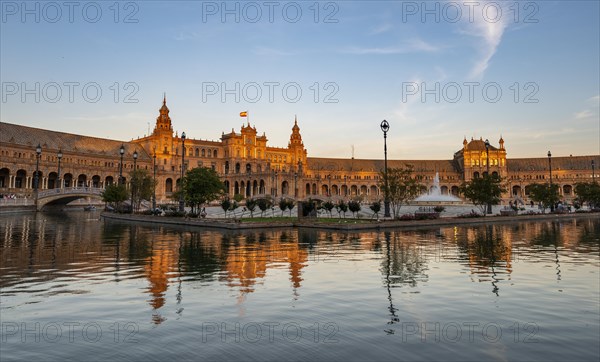 Plaza de Espana in the evening light with reflection in the canal