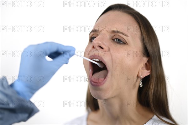 Woman receives throat swab