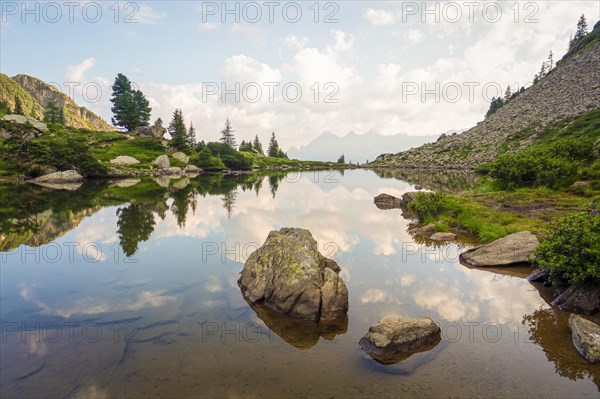 Mirror lake at first light with the Hoher Dachstein in the background