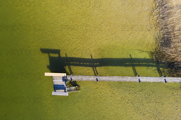 Wooden bridge in the Lake Ammer from above