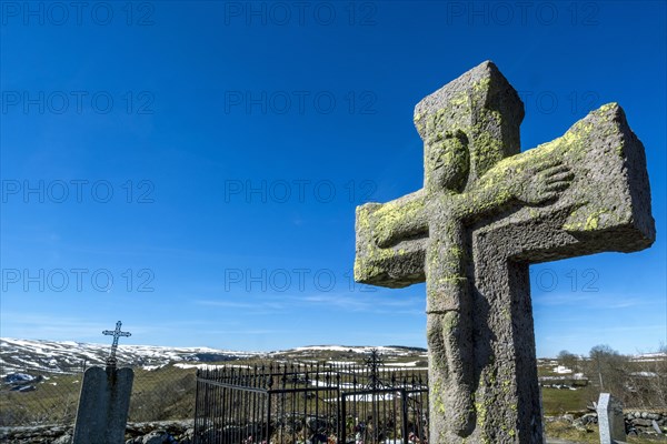 Cemetery stone cross
