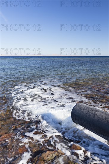 Waste water pipe discharging into the sea