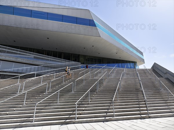 Visitors on large outside staircase