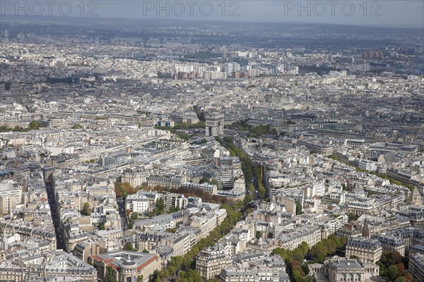 City view from the top of the Eiffel Tower towards Arc de Triomphe