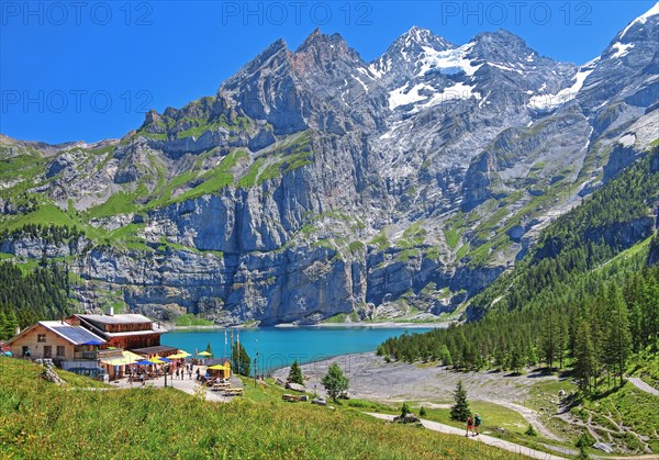 Oeschinensee with mountain inn and Blueemlisalp