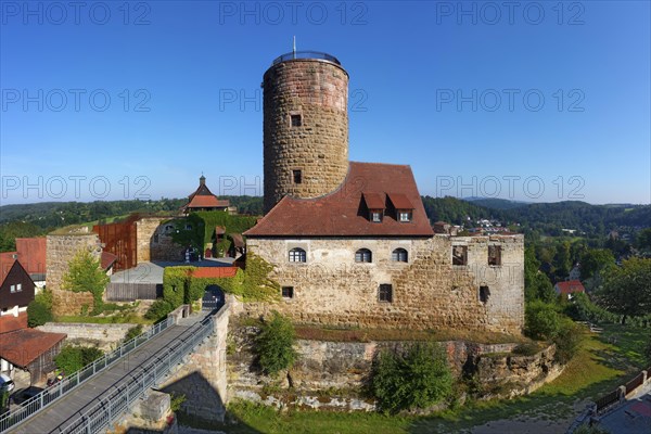 Castle ruin Thann castle with fortified defence tower and moat