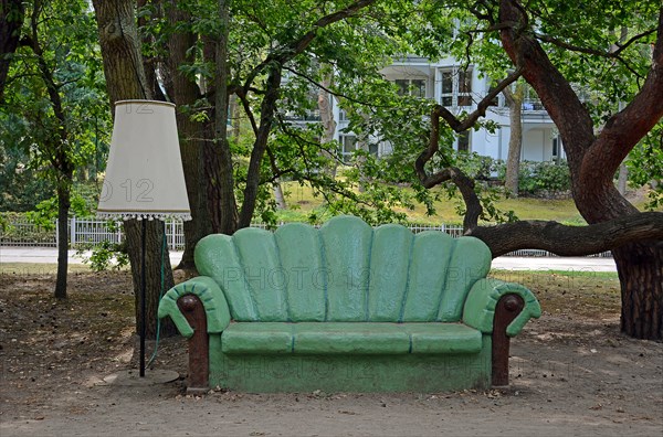 Green sofa and living room lamp