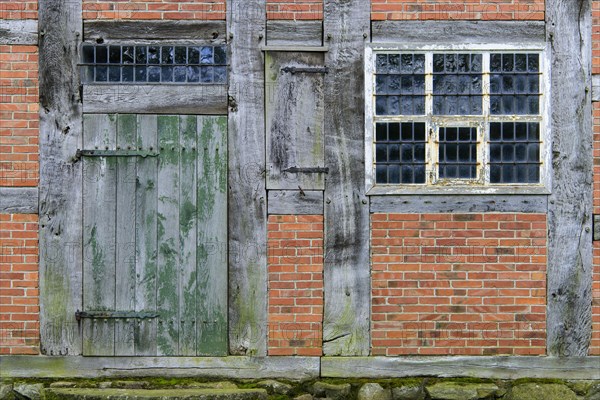 Brick wall with half-timbering