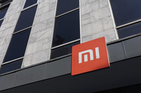 Xiaomi logo on the first store in Germany in the Düsseldorf Altstadt