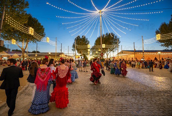 Spanish woman with colourful flamenco dresses