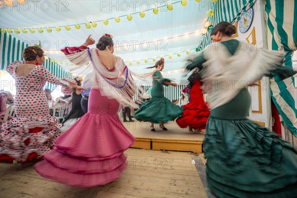 Young woman dancing Sevillano