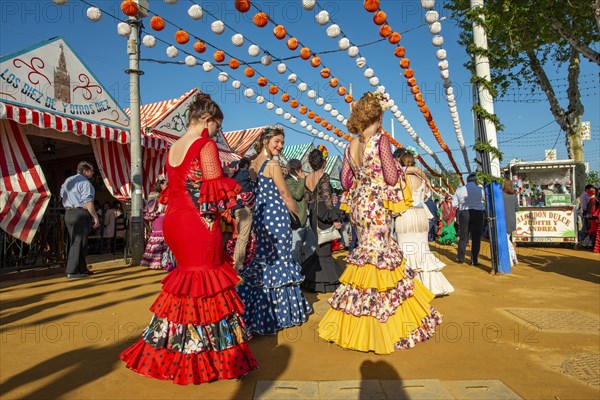 Women in colourful flamenco dresses