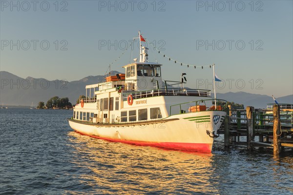 Excursion boat at the landing stage of Gstadt am Chiemsee