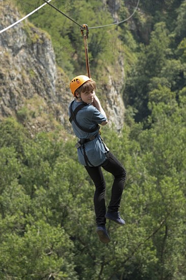 Teenager rides the cable car