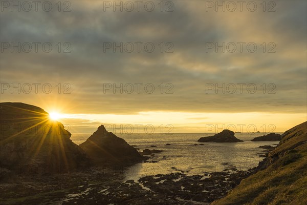 Sunset in the coastal landscape near Bedruthan Steps in Cornwall