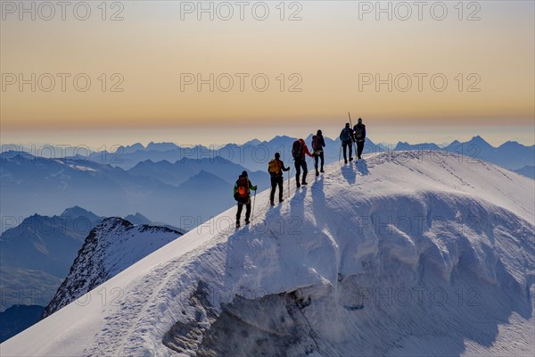 Mountaineer on the summit ridge of the Grossvenediger