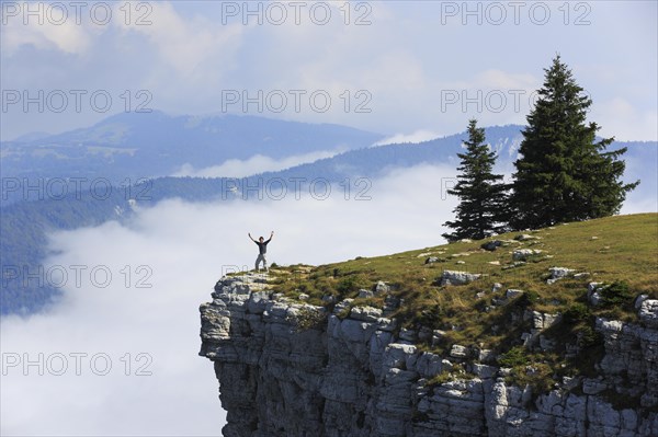 Man standing edge of the Creux du Van