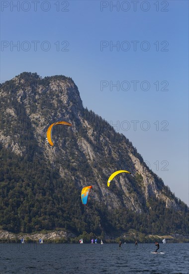 Kitesurfer at the Lake Traun with Sonnstein