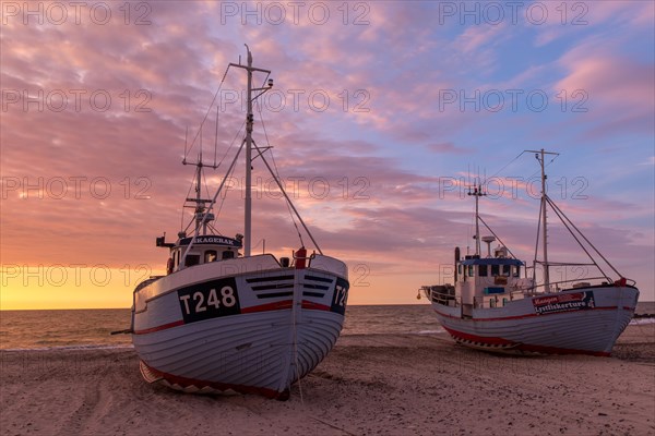 Fishing boats at sunset at the port of Vorupoer