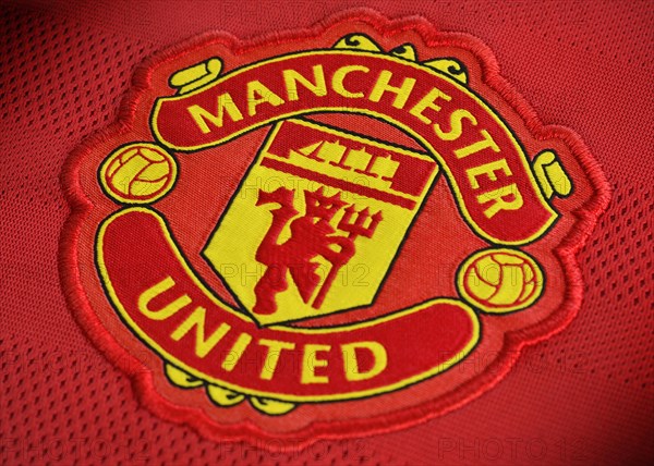 Manchester United badge on a football shirt