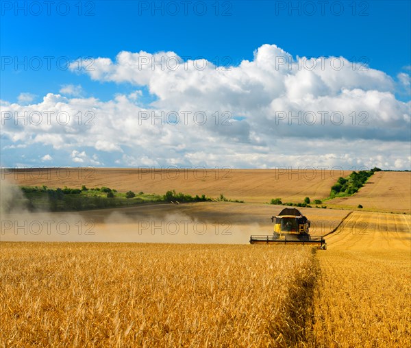 Combine harvests barley