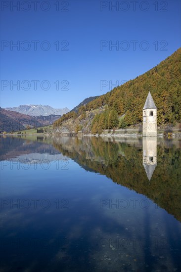 Sunken church tower in the reservoir at the Reschenpass